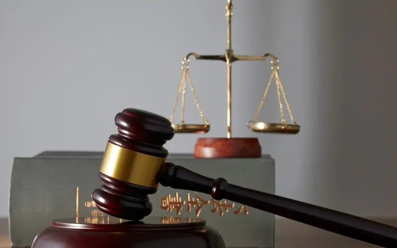 Judge's gavel and scales of justice representing legal services